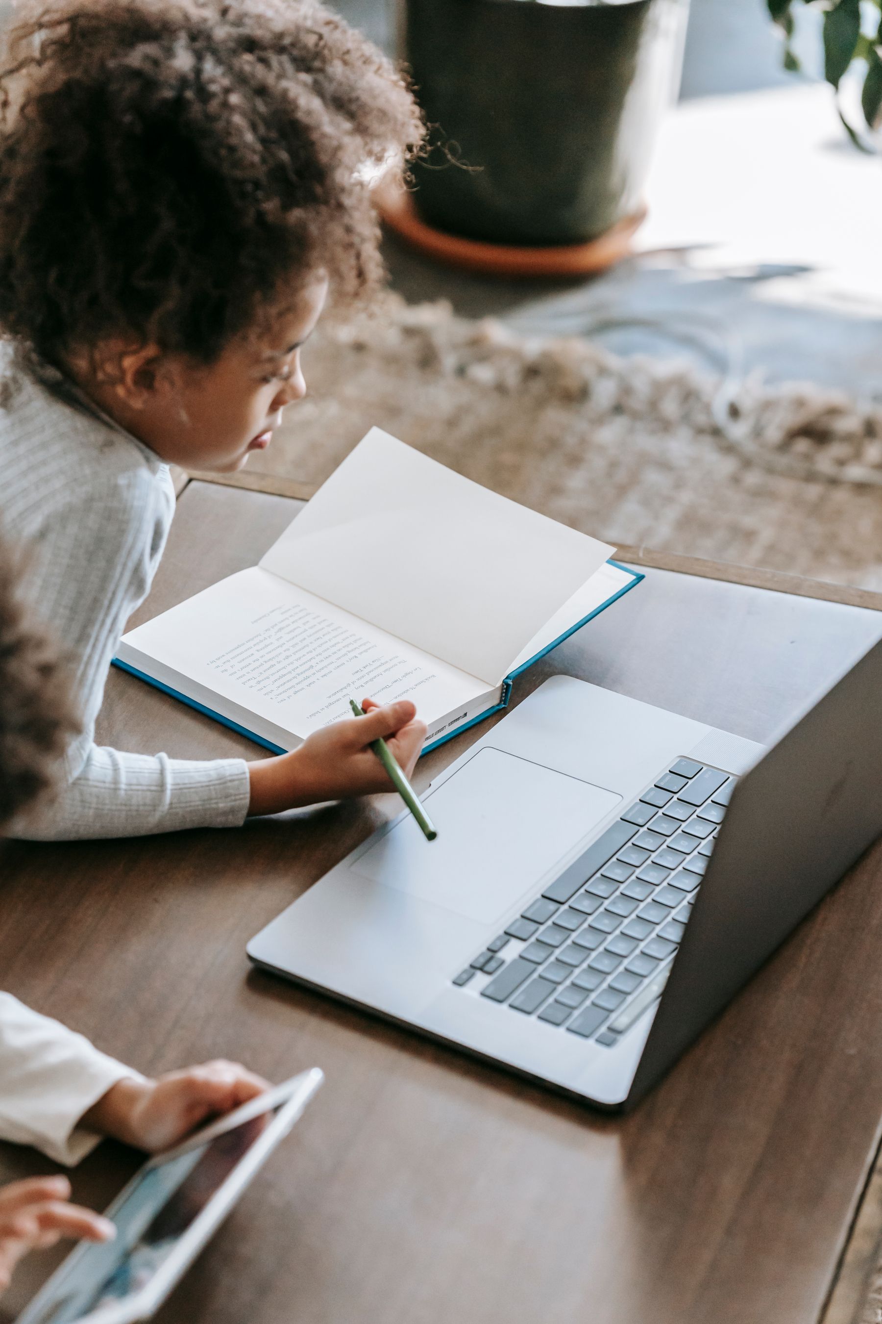 A child studying at a desk