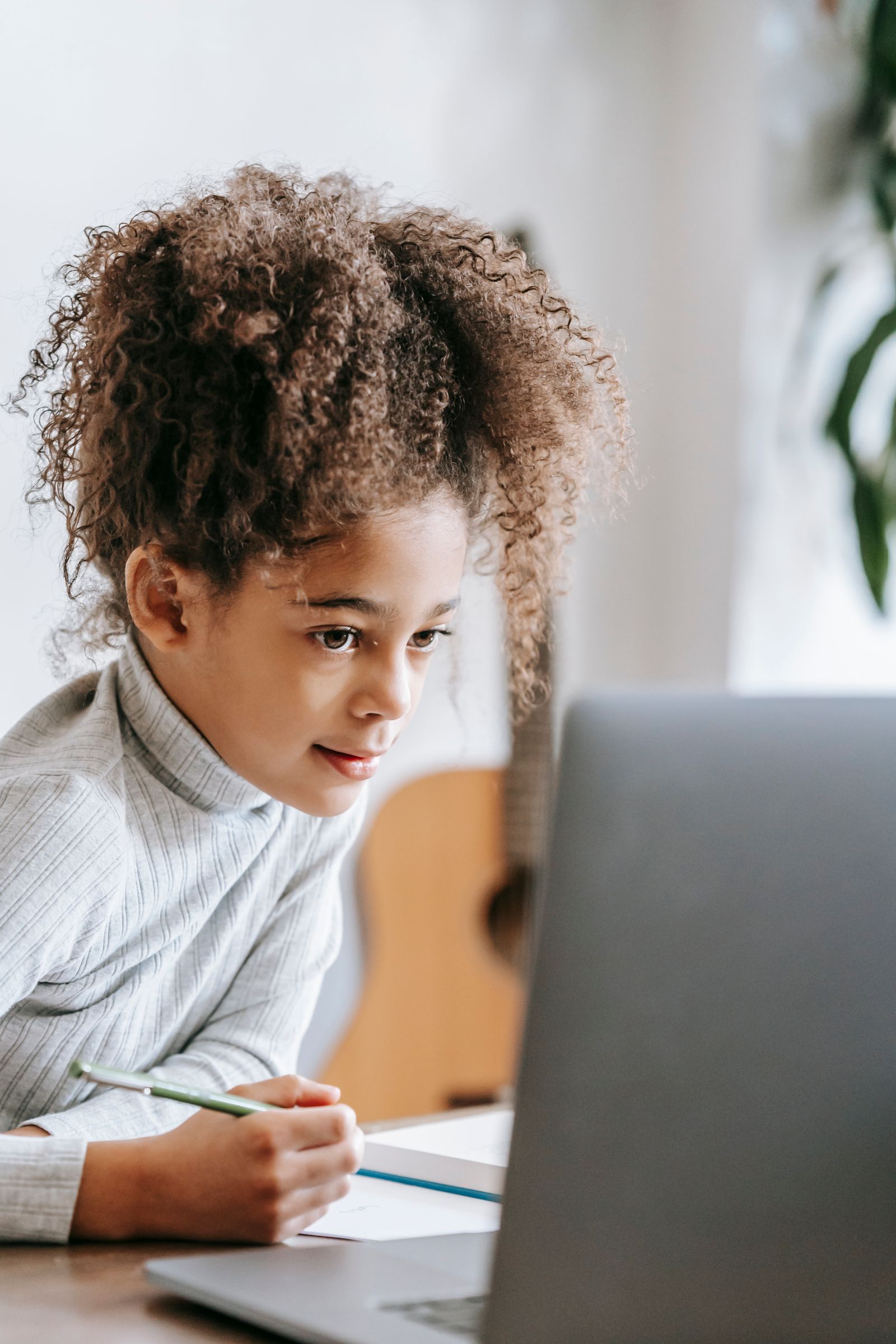 A child reading at a desk